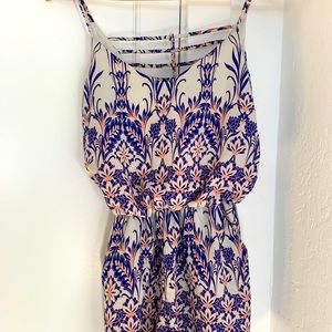 Boutique white patterned romper with pockets